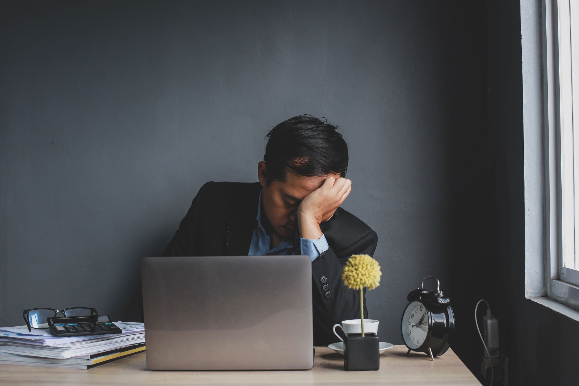 man stressed at work